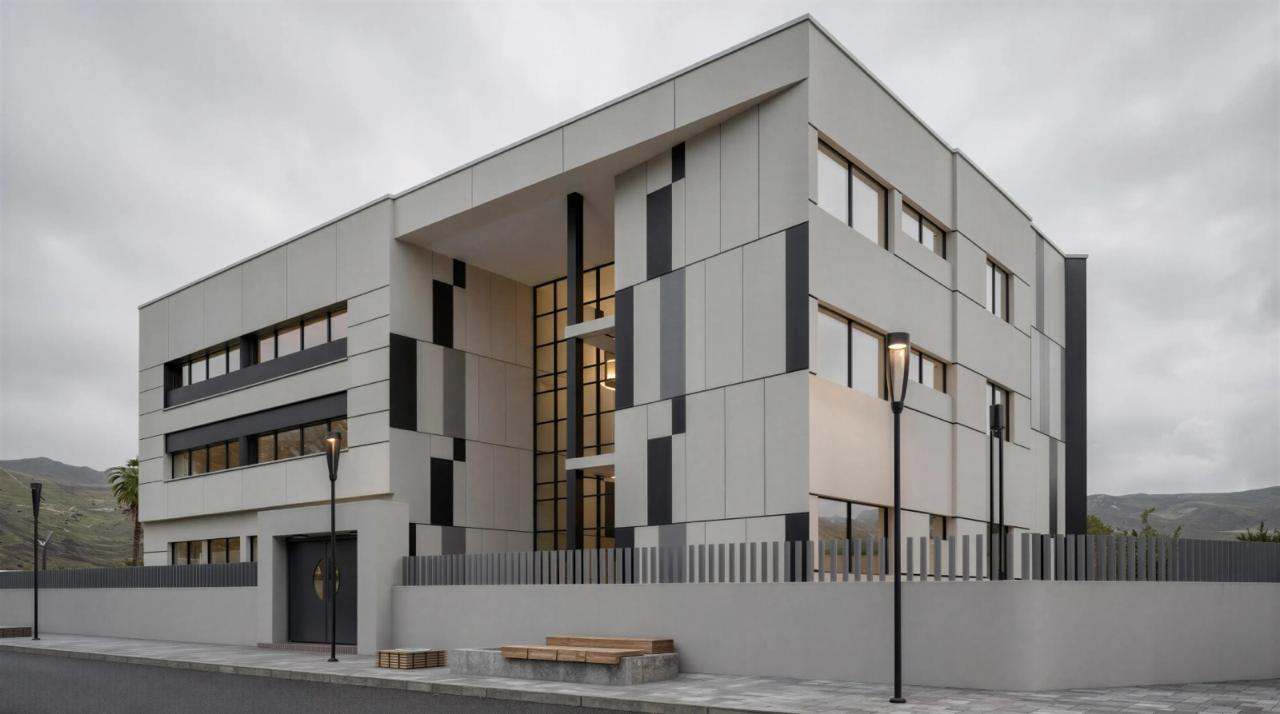 Vue d’architecte, autre série : l’angle de l’entrée, ses panneaux gris et noirs et sa porte à hublot.