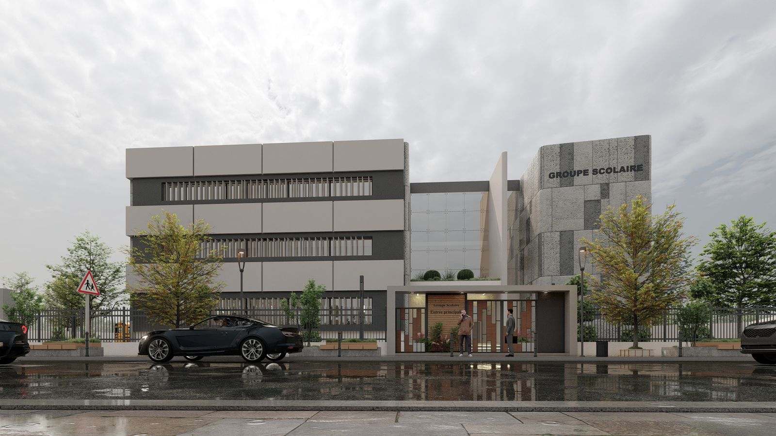 Vue d’architecte : la façade principale de jour, la tour de pierre « Groupe Scolaire », l’atrium vitré et le portique « Entrée principale ».