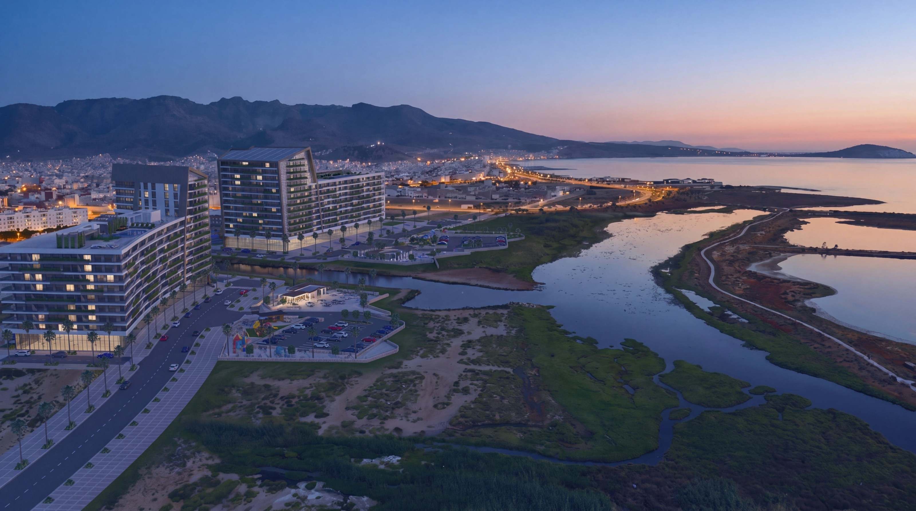 Vue aérienne de Hay El Matar au crépuscule : les immeubles éclairés au bord du canal et de la lagune, les lumières de Nador au loin — perspective d’architecte, variante de lumière « heure bleue ».